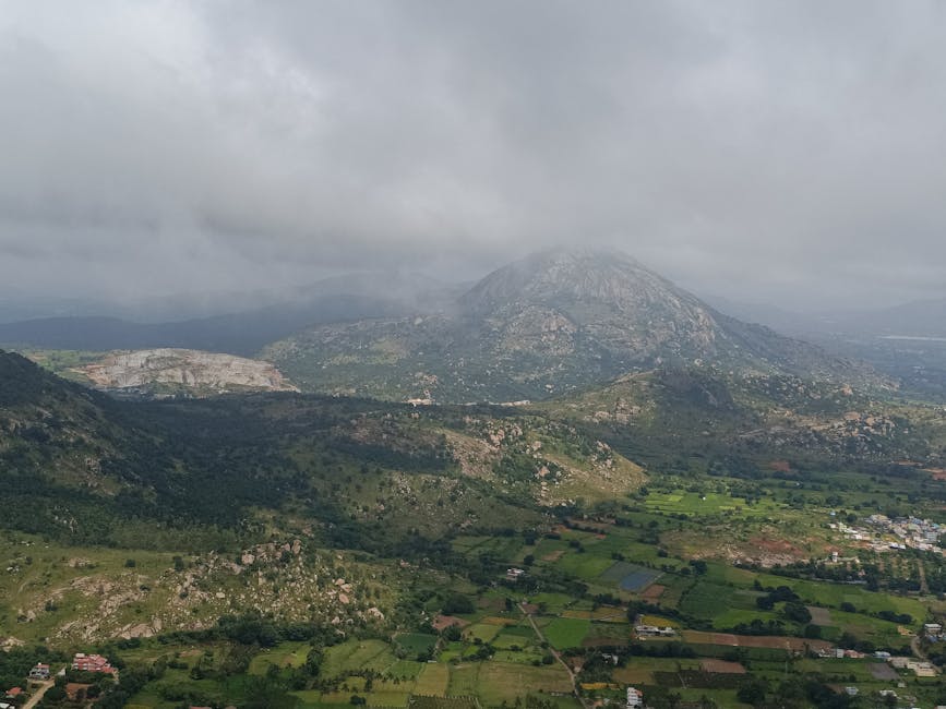 Misty Indian mountain valley aerial view in monsoon