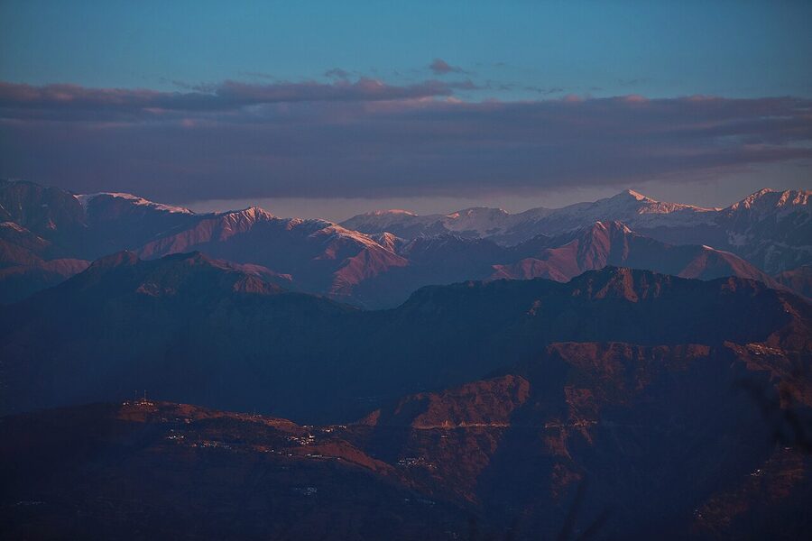 View from Dalhousie of the Pir Panjal mountain range with snow on the higher peaks.