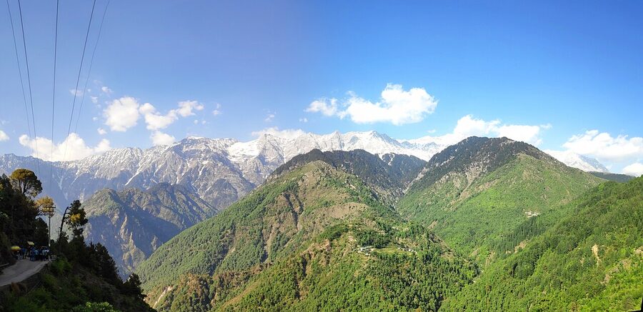The snow-capped Dhauladhar range seen from Naddi viewpoint above Dharamshala, Himachal Pradesh.