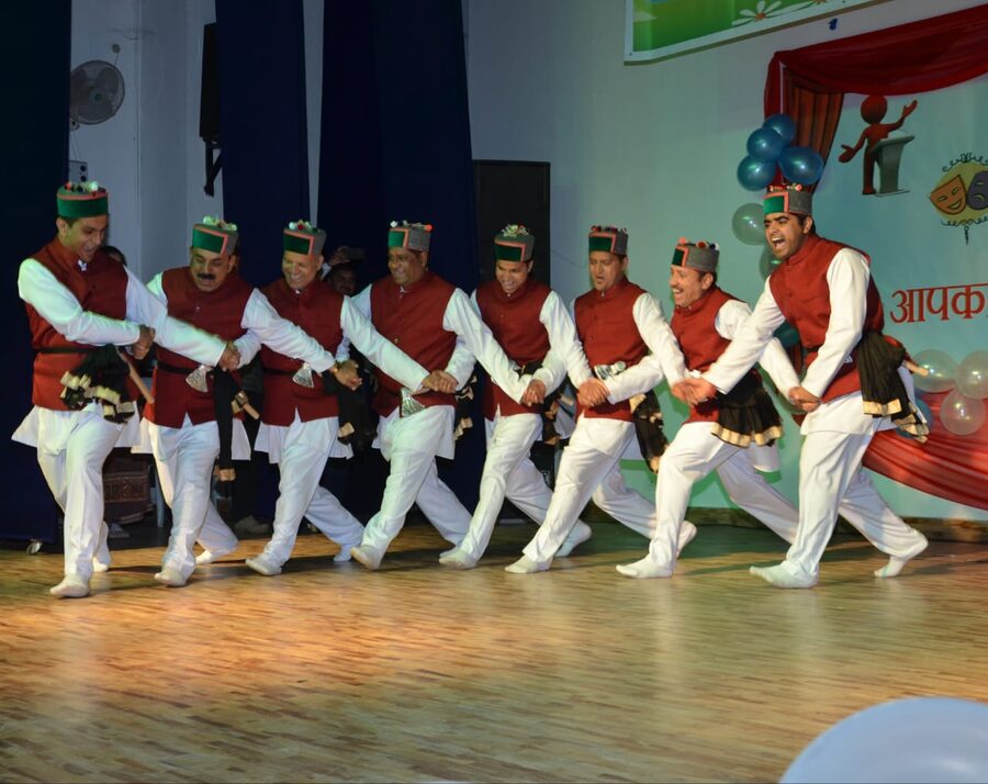 Folk dance group of Himachal Pradesh in traditional festival dress.