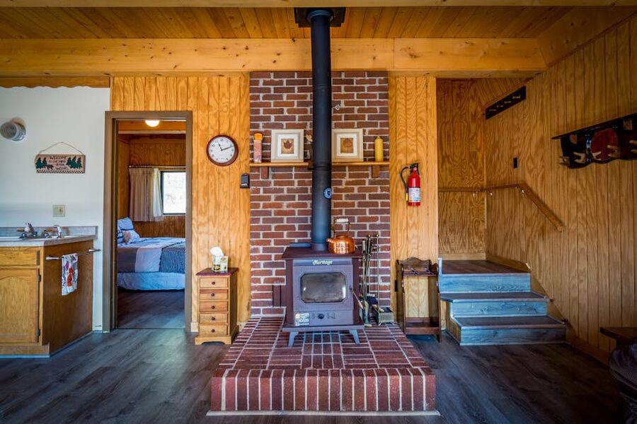 Cosy mountain lodge fireplace and warm interior