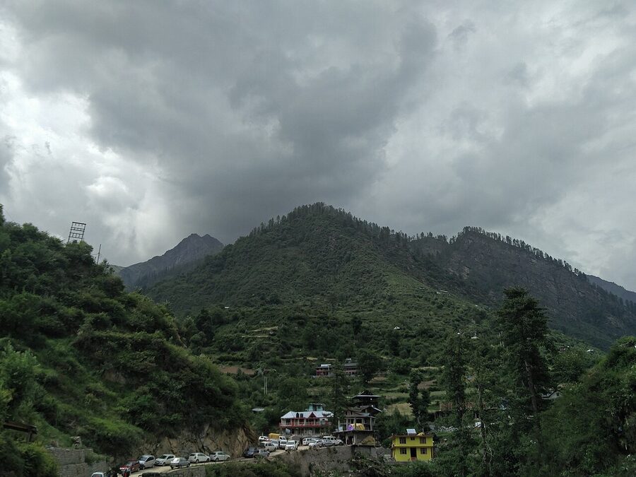 The view from Tosh village over the upper Parvati Valley with snow-capped peaks.