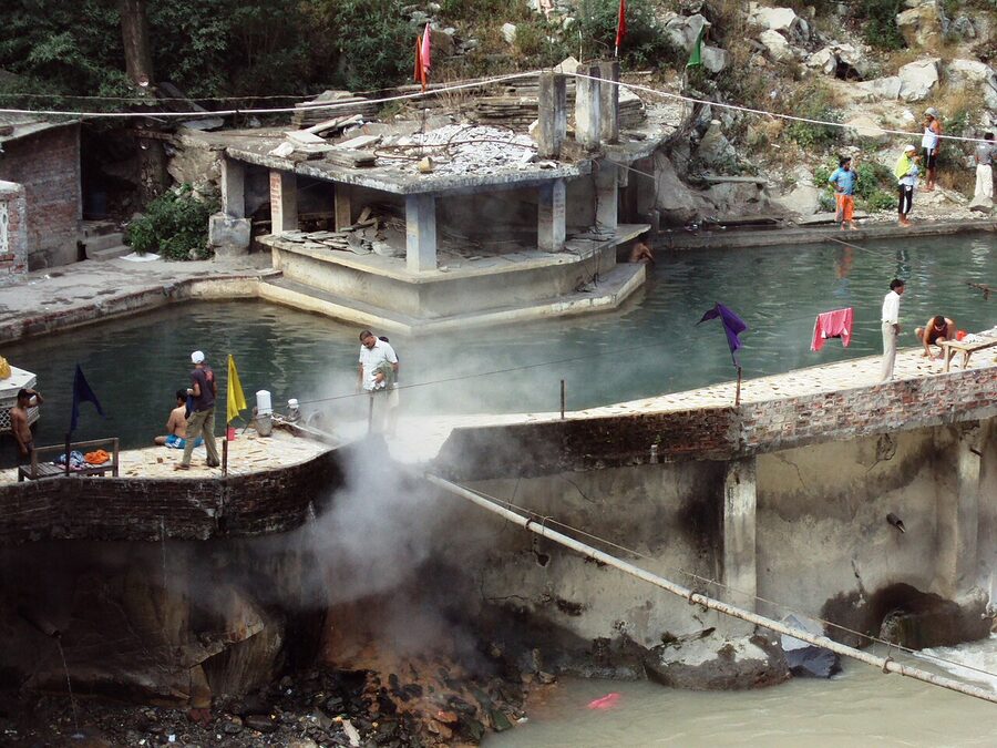 Hot springs at Manikaran with steam rising from the rocks