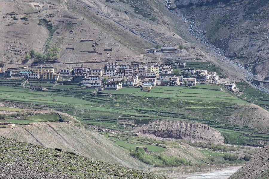 Mud village in the Pin Valley, Spiti, surrounded by towering Himalayan peaks.