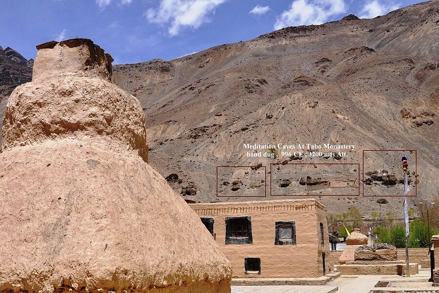 Hand-cut meditation caves on the cliff above Tabo monastery, Spiti Valley.