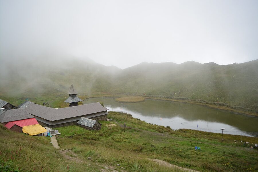 Prashar Lake at 2,730 metres with the three-storeyed pagoda temple on its bank.