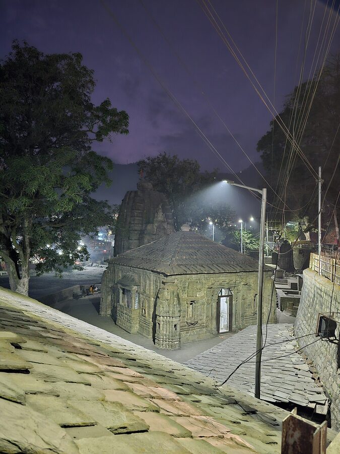 The 16th-century Triloknath stone temple in Mandi with carved shikhara.