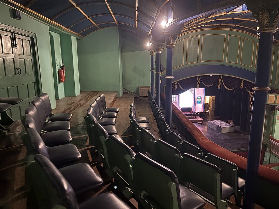 A balcony at the Gaiety Theatre Shimla looking down onto the auditorium.