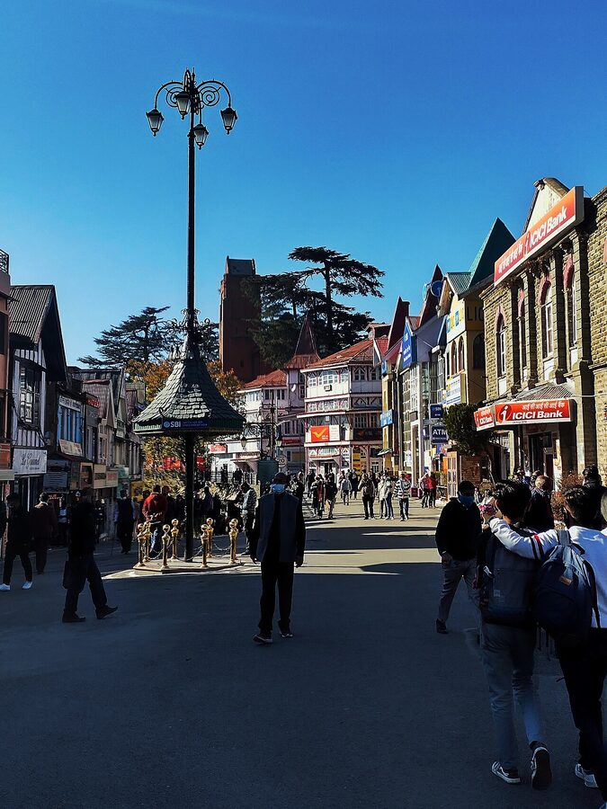Mall Road in Shimla on a busy November weekend with crowds and souvenir stalls.