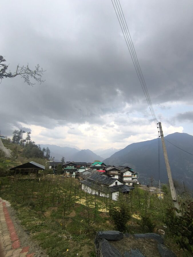 Bahu village in Banjar, Himachal Pradesh, with traditional Himachali houses and terraced fields